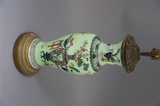 A Chinese famille verte lime green ground vase, late 19th century, H. 42cm including mounts